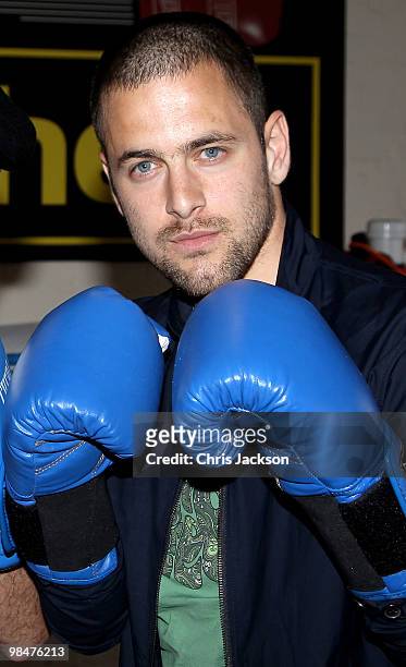 Chelsea footballer Joe Cole steps into the boxing ring during a photocall with his friend and World Title Challenger Kevin Mitchell at TKO Ultrachem...