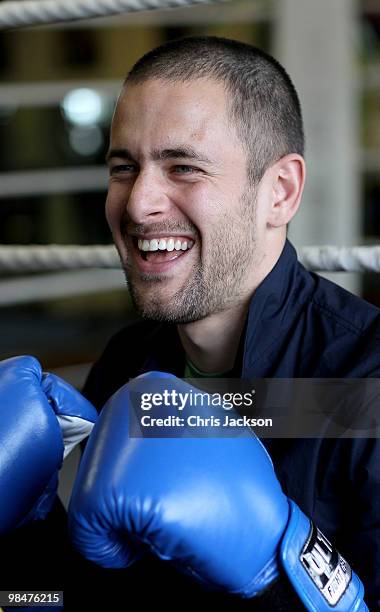 Chelsea footballer Joe Cole steps into the boxing ring during a photocall with his friend and World Title Challenger Kevin Mitchell at TKO Ultrachem...