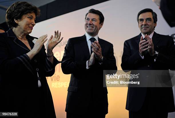 Roselyne Bachelot, France's health minister, left, Christian Estrosi, France's industry minister, center, and Francois Fillon, France's prime...