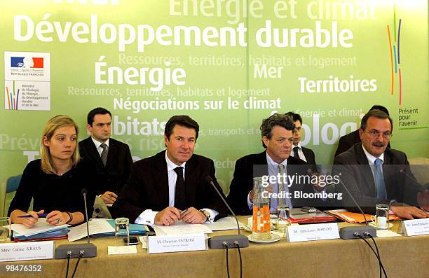 Christian Estrosi, France's industry minister, second from left, and Jean-Louis Borloo, France's minister of ecology and sustainable development,...