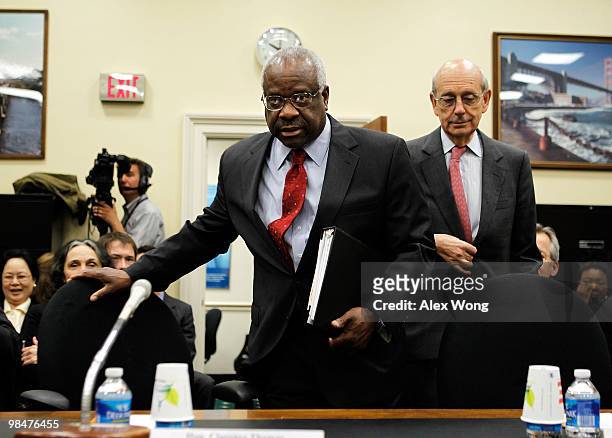 Supreme Court Justices Clarence Thomas and Stephen Breyer arrive for a hearing before the Financial Services and General Government Subcommittee of...