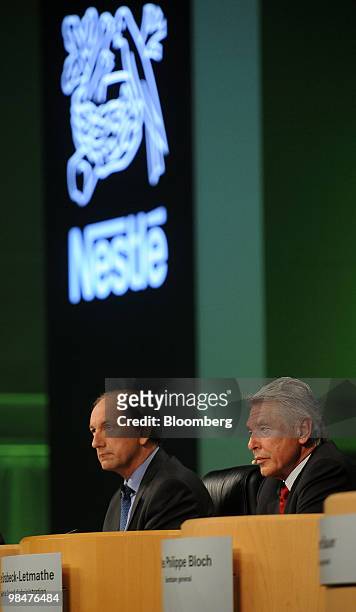 Peter Brabeck-Letmathe, chairman of Nestle SA, right, and Paul Bulcke, chief executive officer of Nestle SA, listen at the company's shareholders'...