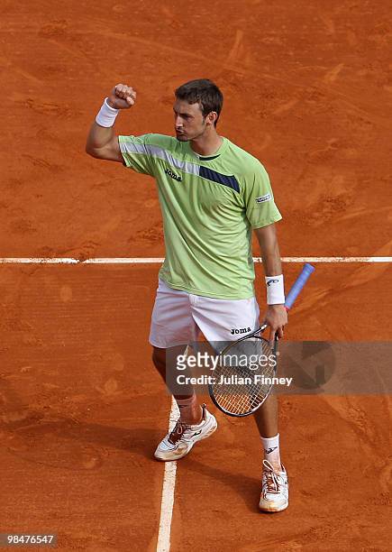 Juan Carlos Ferrero of Spain celebrates defeating Jo-Wilfried Tsonga of France during day four of the ATP Masters Series at the Monte Carlo Country...