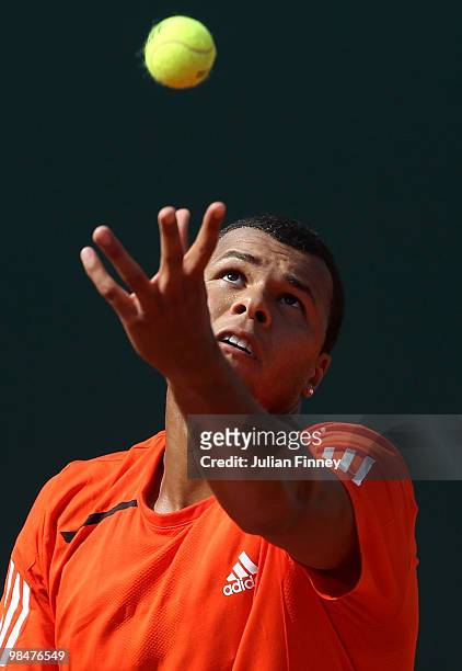 Jo-Wilfried Tsonga of France serves to Juan Carlos Ferrero of Spain during day four of the ATP Masters Series at the Monte Carlo Country Club on...