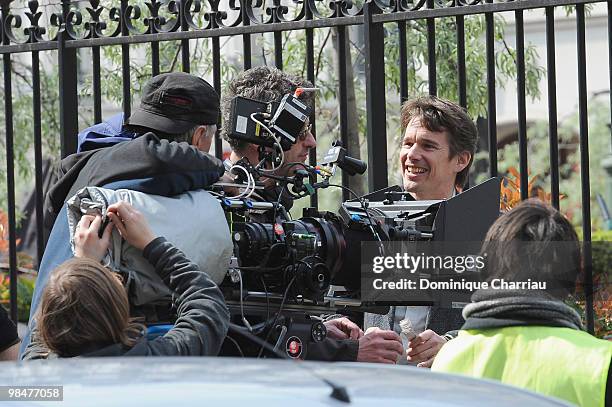 Actor Ethan Hawke and Director Pawel Pawlikowski on location for 'The Woman in the Fifth' in Paris on April 15, 2010 in Paris, France.