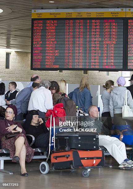 Passengers wait as flights from Israel's Ben Gurion Airport, near Tel Aviv, are cancelled on April 15, 2010 to several European destinations due to...