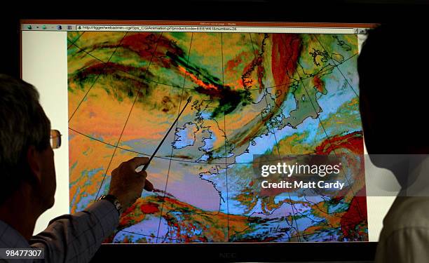 Andy Bodenham, Met Office Forecaster looks at a enchanced colour satellite image highlighting a volcanic ash plume moving towards the United Kingdom...