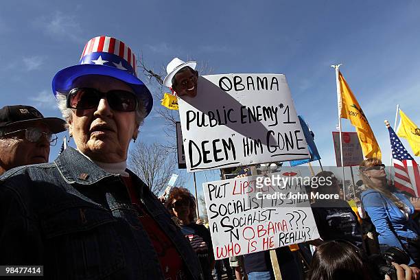 Conservative demonstrators attend a "Tax Day Tea Party" protest on April 15, 2010 in Denver, Colorado. Tea Party groups held anti-government protests...