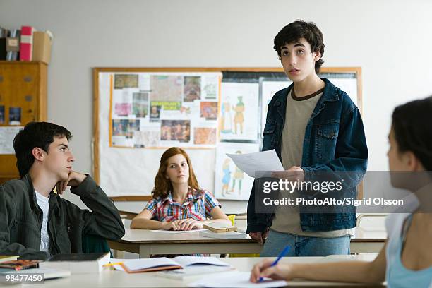 high school student giving presentation in class - reminder on pinboard stock pictures, royalty-free photos & images