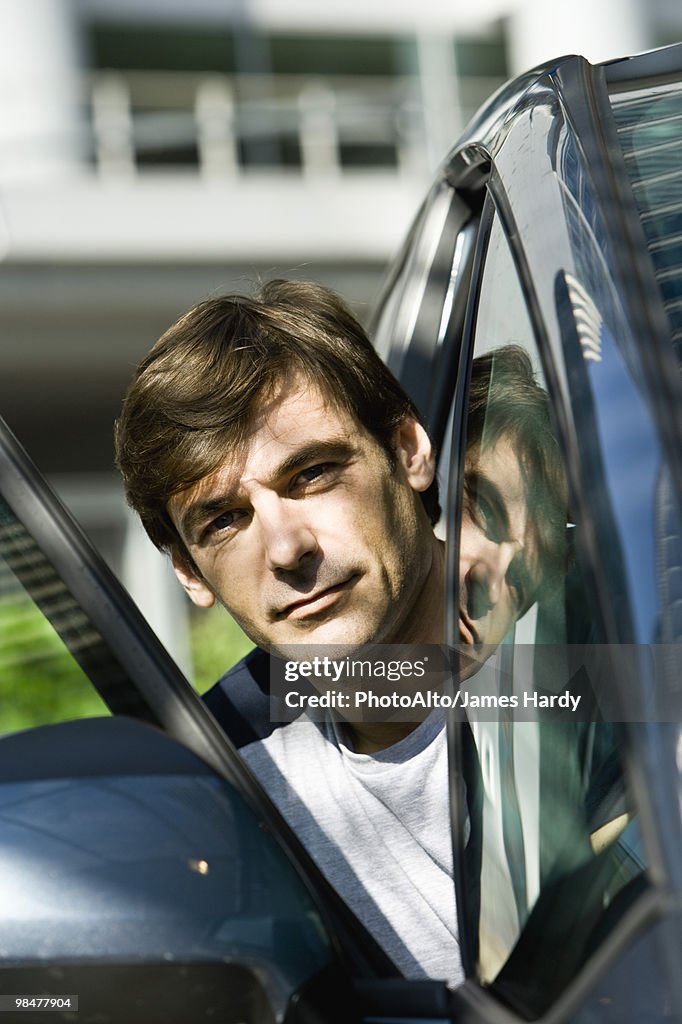 Man getting out of car