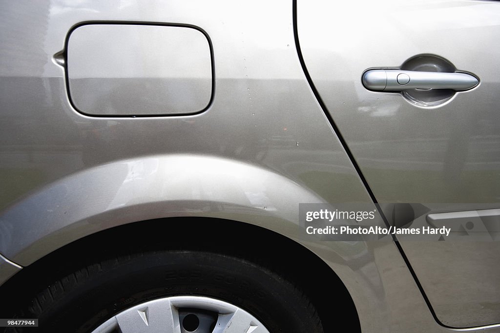 Side of car, view of gas tank