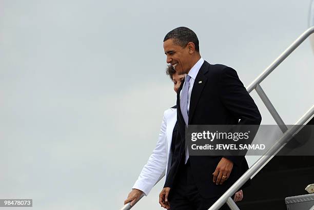 President Barack Obama disembarks Air Force One as he arrives to tour a commercial rocket processing facility at the Cape Canaveral Air Force Station...