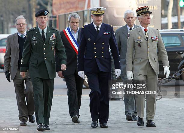 The commander of US and NATO troops in Afghanistan, General Stanley McChrystal and Chief of French army staff Edouard Guillaud arrive to participate...