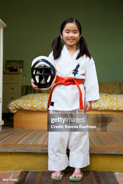 japanese girl in karate uniform - karate girl stockfoto's en -beelden