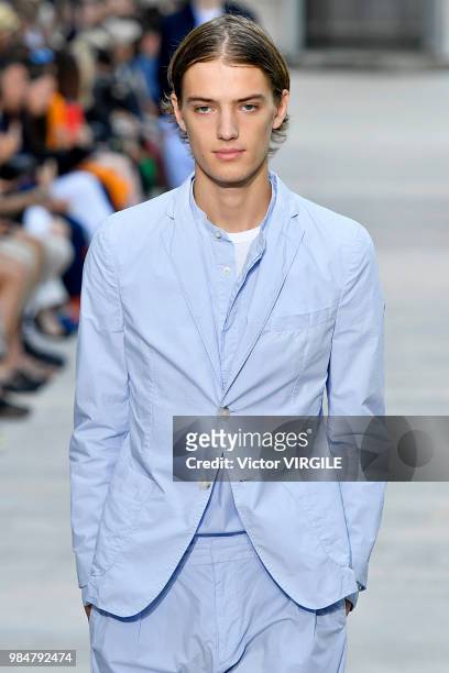 Model walks the runway during the Officine Generale Menswear Spring/Summer 2019 fashion show as part of Paris Fashion Week on June 24, 2018 in Paris,...