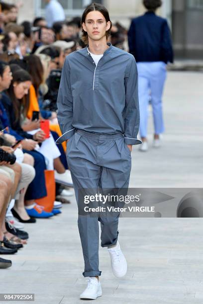 Model walks the runway during the Officine Generale Menswear Spring/Summer 2019 fashion show as part of Paris Fashion Week on June 24, 2018 in Paris,...