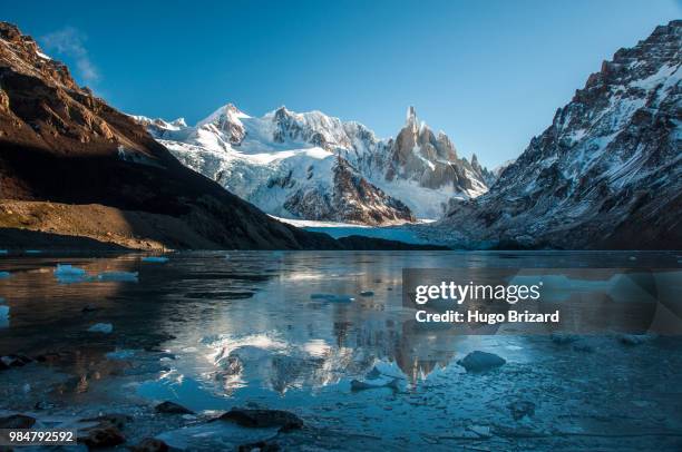 frozen lake reflection at the cerro torre, fitz roy, argentina - lake argentina stock pictures, royalty-free photos & images