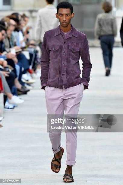 Model walks the runway during the Officine Generale Menswear Spring/Summer 2019 fashion show as part of Paris Fashion Week on June 24, 2018 in Paris,...