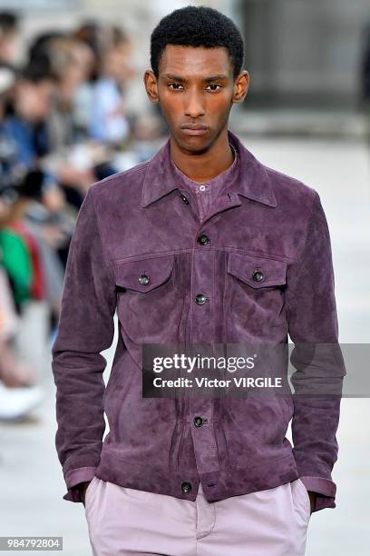 Model walks the runway during the Officine Generale Menswear Spring/Summer 2019 fashion show as part of Paris Fashion Week on June 24, 2018 in Paris,...