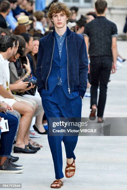 Model walks the runway during the Officine Generale Menswear Spring/Summer 2019 fashion show as part of Paris Fashion Week on June 24, 2018 in Paris,...