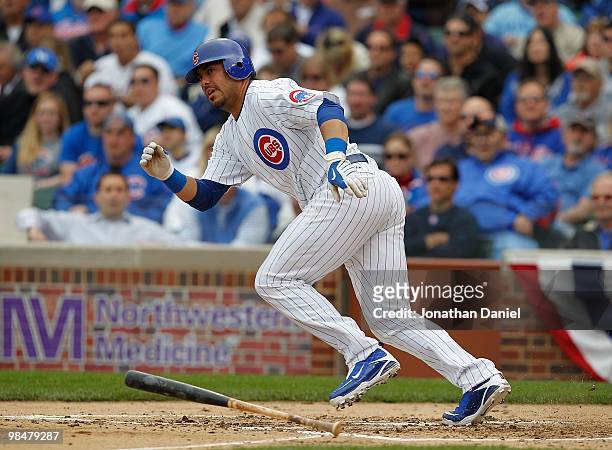 Geovaney Soto of the Chicago Cubs runs after hitting the ball against the Milwaukee Brewers on Opening Day at Wrigley Field on April 12, 2010 in...