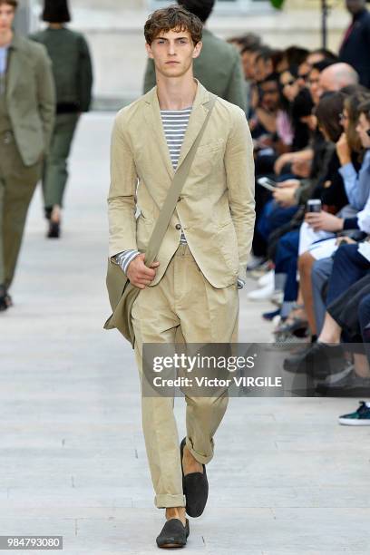 Model walks the runway during the Officine Generale Menswear Spring/Summer 2019 fashion show as part of Paris Fashion Week on June 24, 2018 in Paris,...