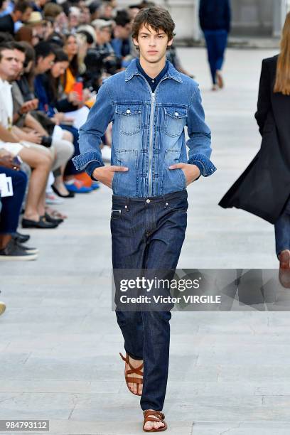 Model walks the runway during the Officine Generale Menswear Spring/Summer 2019 fashion show as part of Paris Fashion Week on June 24, 2018 in Paris,...