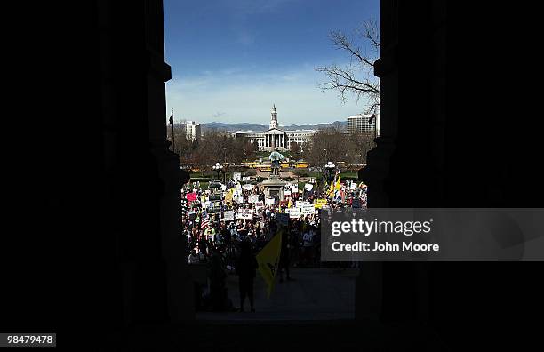 Conservative demonstrators attend a "Tax Day Tea Party" protest at the state capitol building on April 15, 2010 in Denver, Colorado. Tea Party groups...