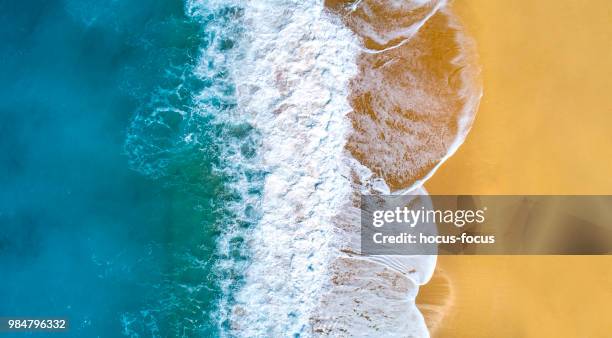 sandy beach and wave - helicopter point of view stock pictures, royalty-free photos & images