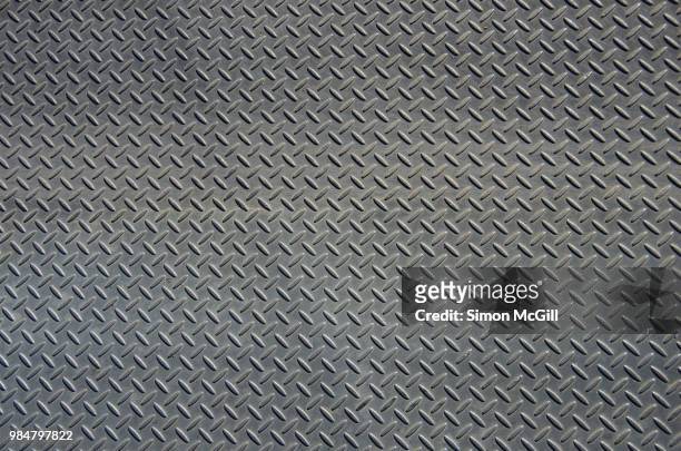 stainless steel metal plate flooring with crosshatch non-slip texture - metal texture imagens e fotografias de stock