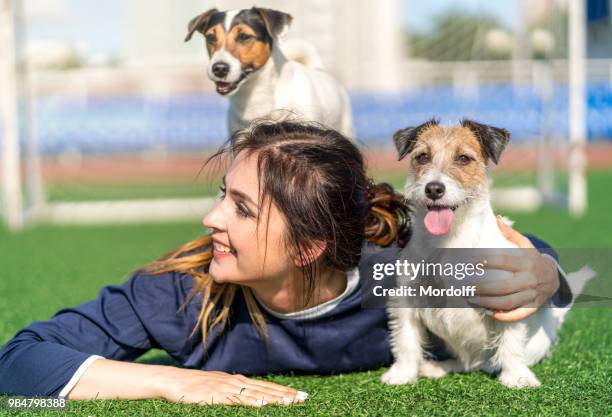 happy friends soccer team - dog trainer stock pictures, royalty-free photos & images