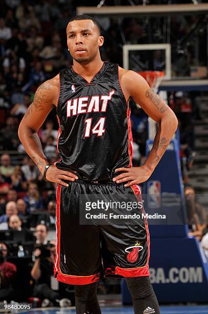 Daequan Cook of the Miami Heat stands on the court during the game against the Orlando Magic on February 28, 2010 at Amway Arena in Orlando, Florida....
