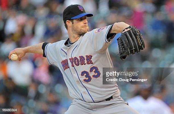 Starting pitcher John Maine of the New York Mets delivers against the Colorado Rockies during Major League Baseball action at Coors Field on April...