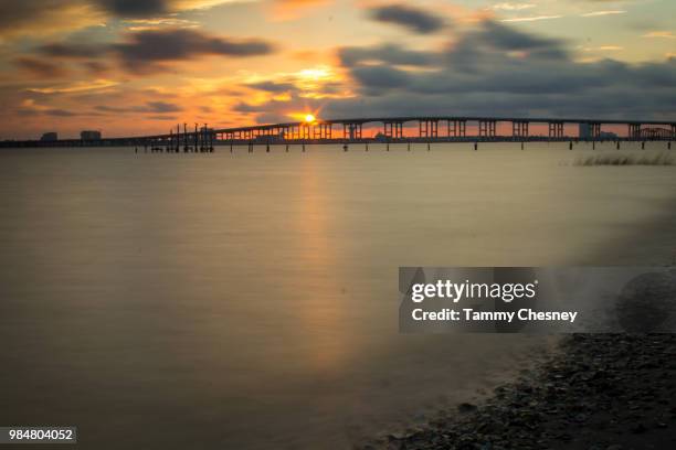 ocean springs sunset - ocean springs stock pictures, royalty-free photos & images