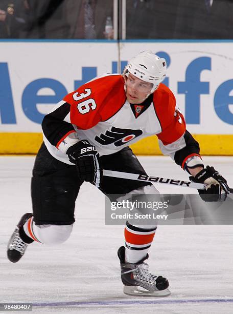 Darroll Powe of the Philadelphia Flyers looks for the puck as he skates against the New York Rangers on April 9, 2010 at Madison Square Garden in New...