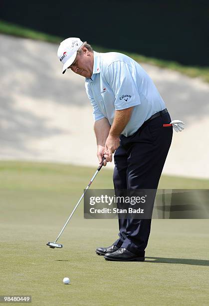 Hal Sutton hits a putt on the 10th green during the Red Stag Challenge presented by Jim Beam for the Outback Steakhouse Pro-Am at TPC Tampa Bay on...