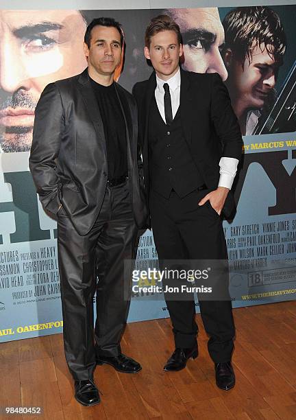 Actors Adrian Paul and Lee Ryan attend 'The Heavy' film premiere at the Odeon West End on April 15, 2010 in London, England.
