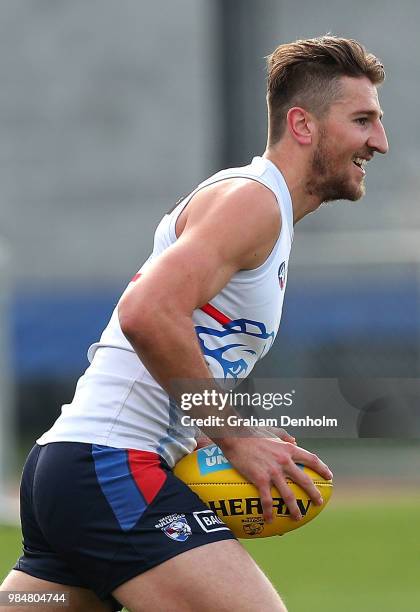Marcus Bontempelli of the Bulldogs smiles during a training session at Whitten Oval on June 27, 2018 in Melbourne, Australia.