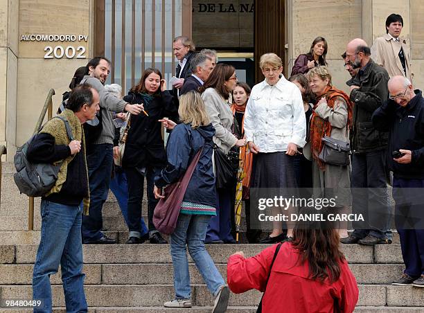Gabrielle Domon , sister of French nun Alice Domon, kidnapped in Argentina in 1977, is congratulated by relatives and friends in front of the justice...