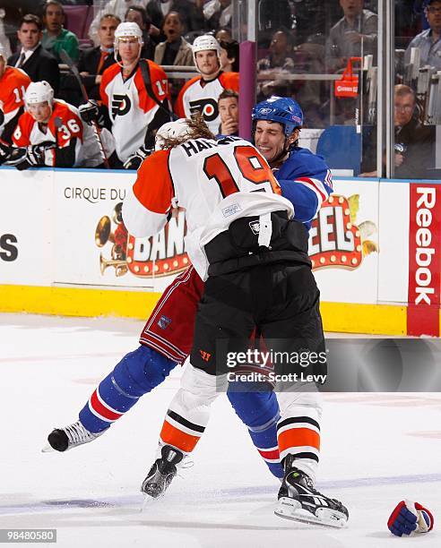 Dan Girardi of the New York Rangers fights against Scott Hartnell of the Philadelphia Flyers on April 9, 2010 at Madison Square Garden in New York...