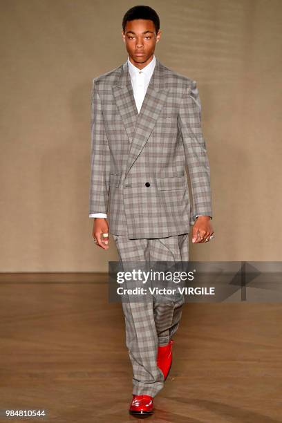 Model walks the runway during the Paul Smith Menswear Spring/Summer 2019 fashion show as part of Paris Fashion Week on June 24, 2018 in Paris, France.