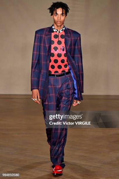 Model walks the runway during the Paul Smith Menswear Spring/Summer 2019 fashion show as part of Paris Fashion Week on June 24, 2018 in Paris, France.