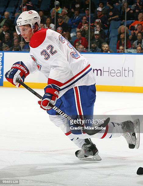 Travis Moen of the Montreal Canadiens skates against the New York Islanders on April 6, 2010 at Nassau Coliseum in Uniondale, New York. Islanders...