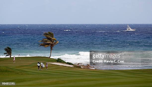 Cristie Kerr of the United States and Beatriz Recari of Spain walk onto the fifth green during the first round of The Mojo 6 Jamaica LPGA...