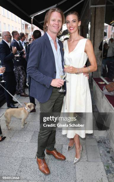 Mike Kraus and his wife Constanze, "Coco" Kraus during the opening of the first "Krug Fischmarkt" pop up fish restaurant on June 26, 2018 in Munich,...