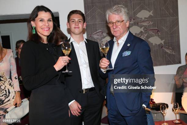 Prof. Marion Kiechle, Minister CSU and her husband Marcel Reif and his son Tim Reif during the opening of the first "Krug Fischmarkt" pop up fish...