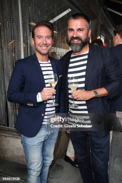 Sebastian Hoeffner, Andreas Haumesser during the opening of the first "Krug Fischmarkt" pop up fish restaurant on June 26, 2018 in Munich, Germany.