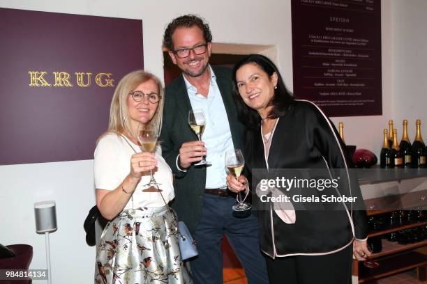 Alexa Agnelli, Jens Gardthausen, General Manager Moet Hennessy Germany and Margareth Henriquez, CEO of Krug during the opening of the first "Krug...