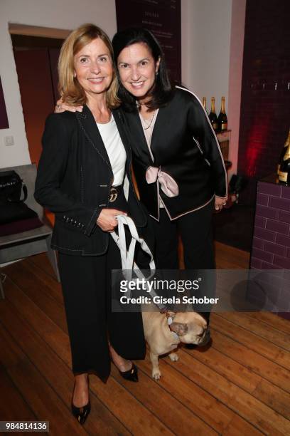 Johanna Fischer and Margareth Henriquez, CEO of Krug during the opening of the first "Krug Fischmarkt" pop up fish restaurant on June 26, 2018 in...