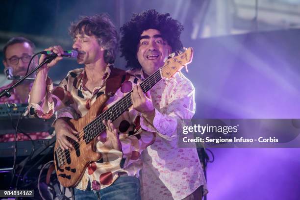 Faso and Elio of Elio e le Storie Tese perform on stage at CarroPonte on June 26, 2018 in Milan, Italy.